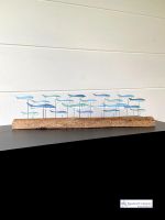 Shoal of Blue Fish on Wood Stand